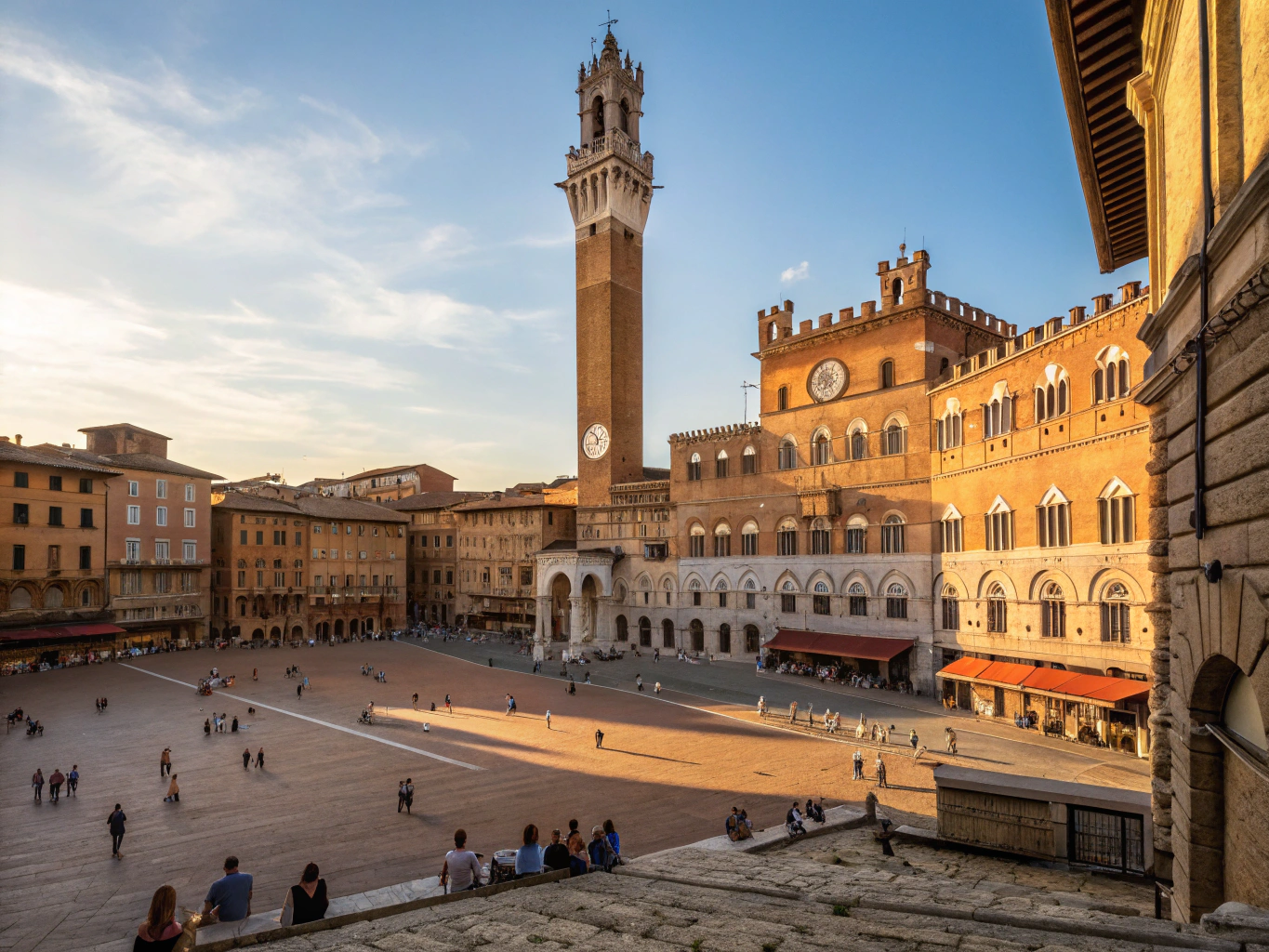 Siena's iconic Piazza del Campo with Torre del Mangia and historic Renaissance architecture, Tuscany